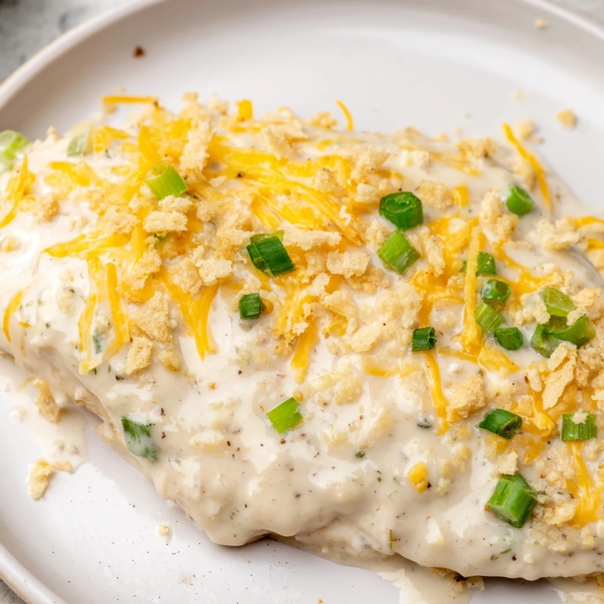 Family-style Sour Cream and Onion Chicken straight from the oven, perfect alongside steamed vegetables or mashed potatoes.