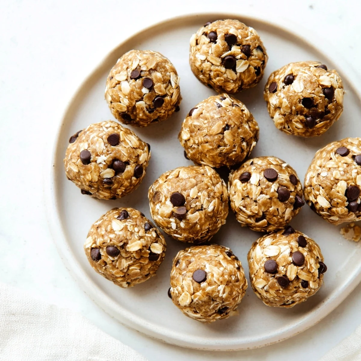 A plate of No Bake Peanut Butter Energy Bites ready to serve, perfect for a quick afternoon snack.