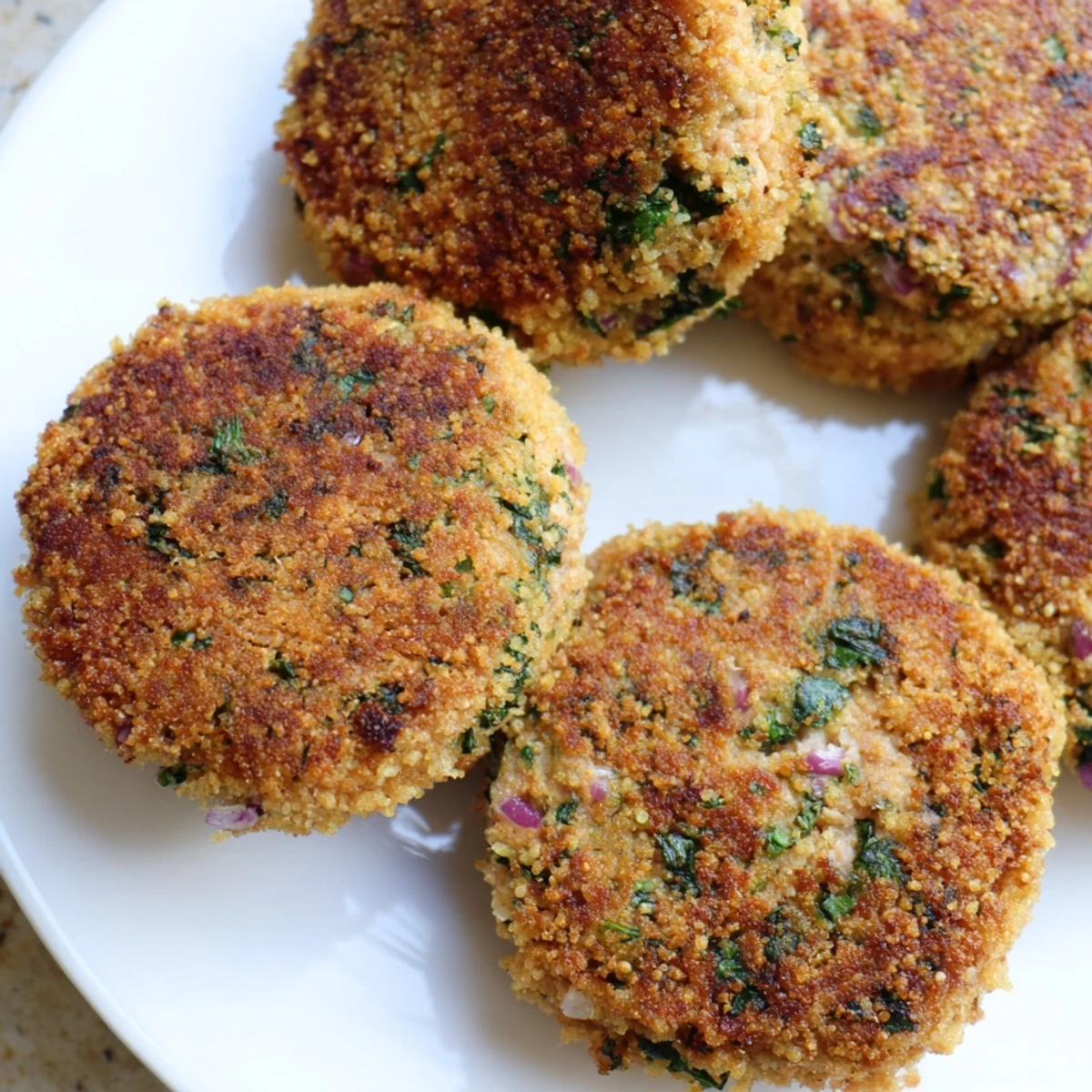 Homemade crispy tuna cakes with tender flaky texture and crunchy breadcrumb coating