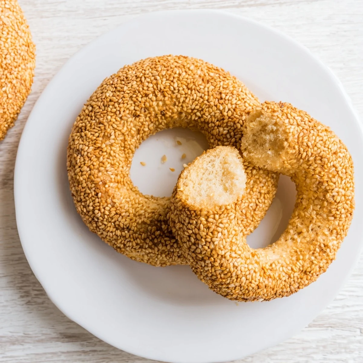 Basket of Mediterranean sesame bread rings coated generously in toasted seeds ready for snacking