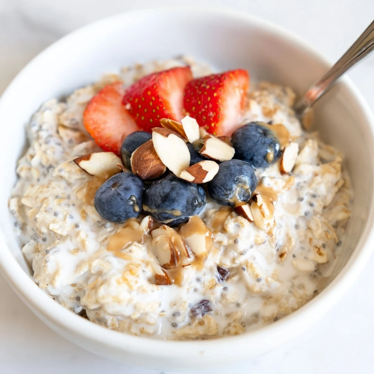 Protein Overnight Oats served for breakfast, thick texture, sprinkled with cinnamon.