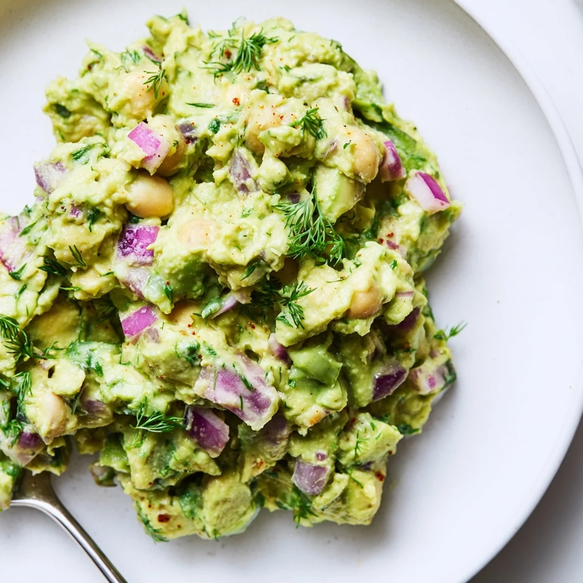 Chunky Smashed Chickpea Avocado Pickle with crunchy dill pickles and cilantro